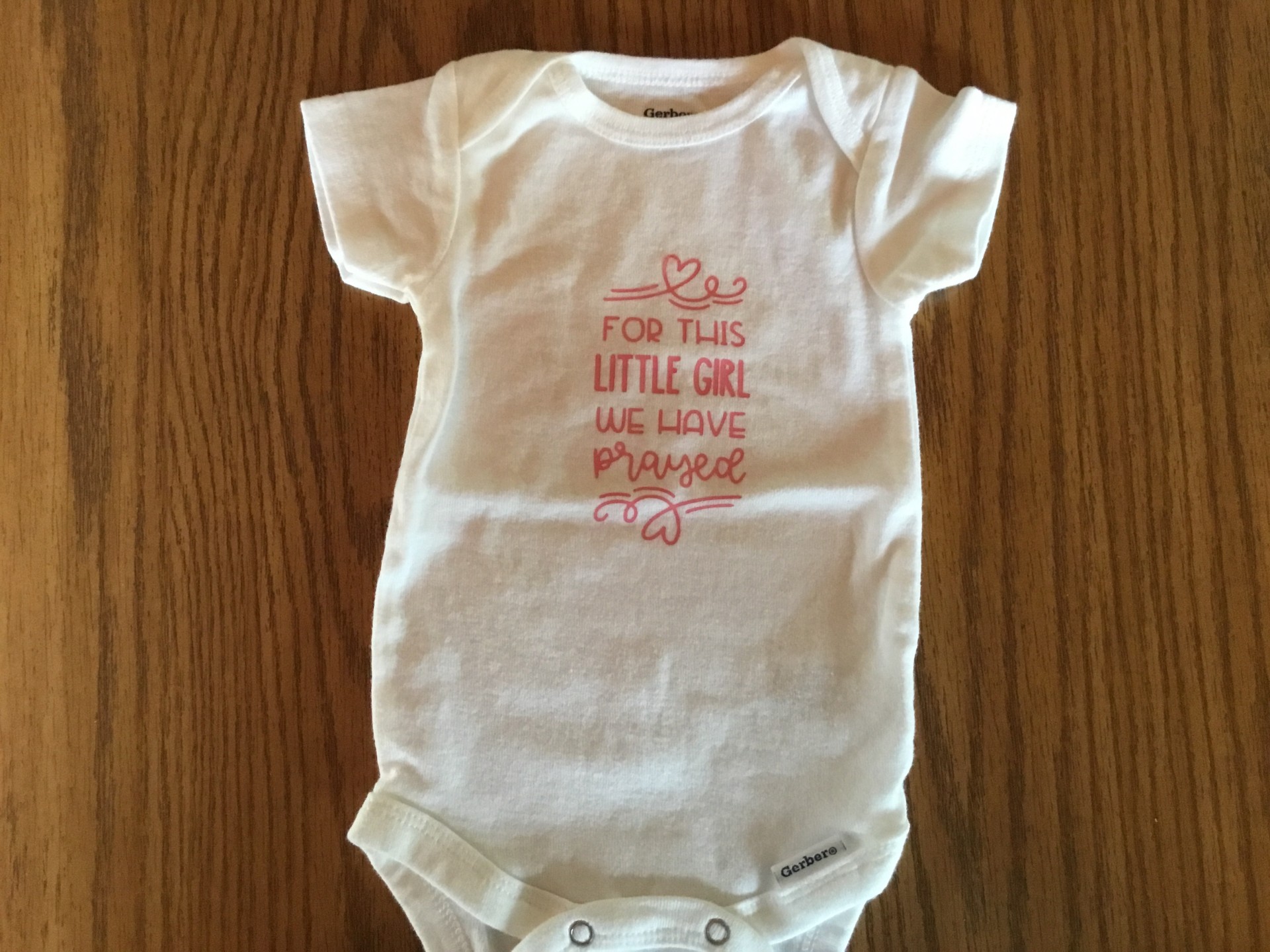 Baby one piece shirt.