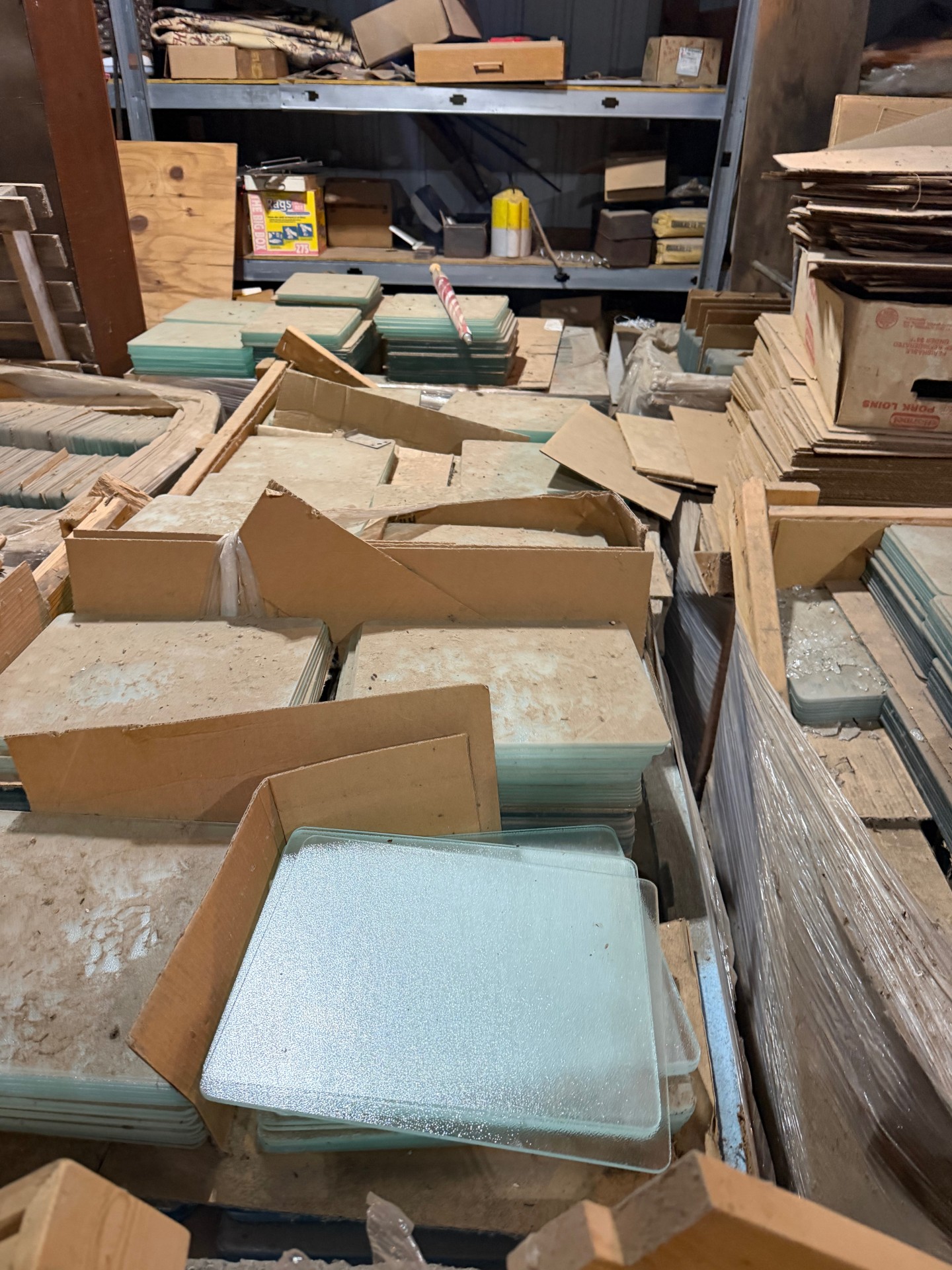 Thousands of glass cutting boards/trivets